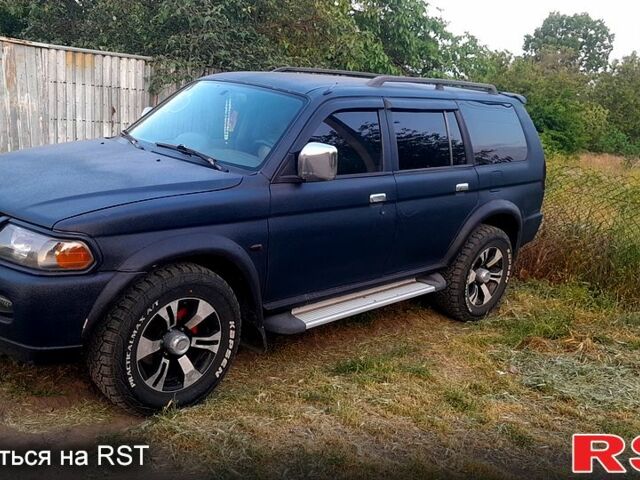 Синий Мицубиси Паджеро Спорт, объемом двигателя 3 л и пробегом 300 тыс. км за 7500 $, фото 1 на Automoto.ua