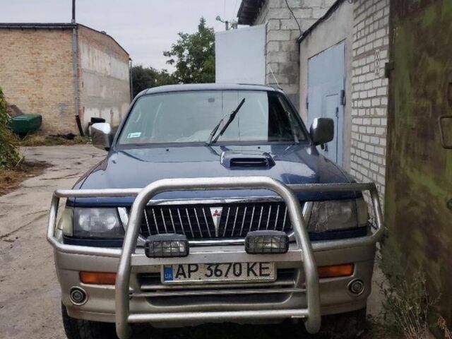 Синий Мицубиси Паджеро Спорт, объемом двигателя 2.5 л и пробегом 3 тыс. км за 3500 $, фото 1 на Automoto.ua