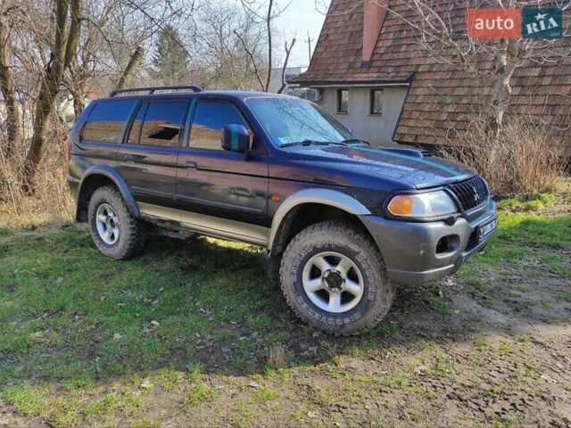 Синий Мицубиси Паджеро Спорт, объемом двигателя 2.5 л и пробегом 257 тыс. км за 5300 $, фото 1 на Automoto.ua