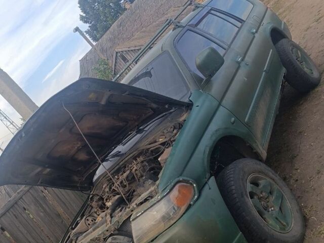 Зеленый Мицубиси Паджеро Спорт, объемом двигателя 3 л и пробегом 240 тыс. км за 1500 $, фото 1 на Automoto.ua