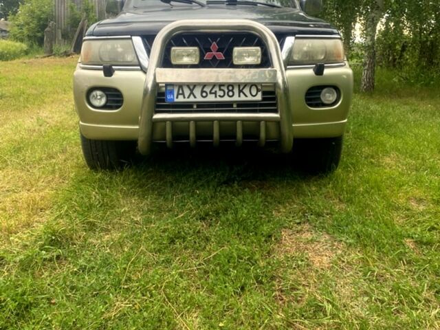 Зеленый Мицубиси Паджеро Спорт, объемом двигателя 3 л и пробегом 315 тыс. км за 4800 $, фото 1 на Automoto.ua