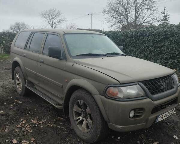 Зеленый Мицубиси Паджеро Спорт, объемом двигателя 2.97 л и пробегом 250 тыс. км за 4500 $, фото 1 на Automoto.ua