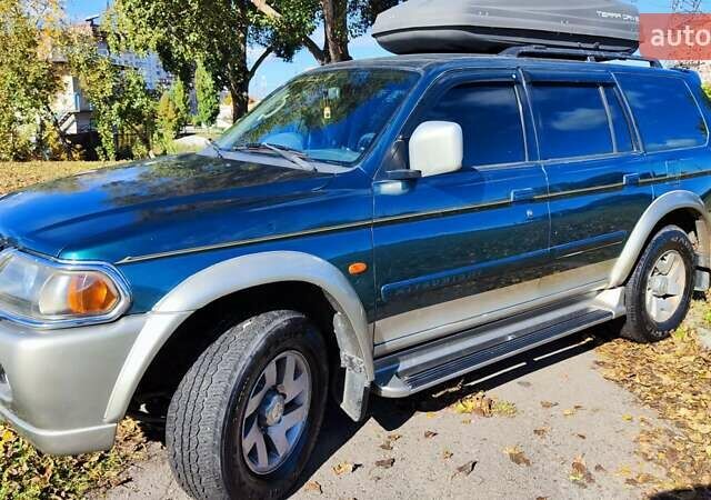 Зелений Міцубісі Паджеро Спорт, об'ємом двигуна 2.97 л та пробігом 230 тис. км за 7200 $, фото 1 на Automoto.ua