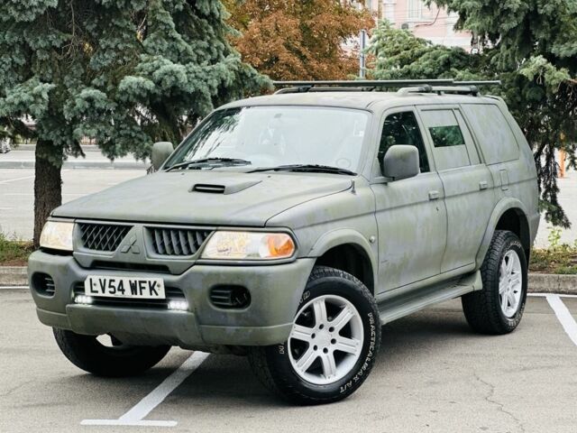 Зеленый Мицубиси Паджеро Спорт, объемом двигателя 2.5 л и пробегом 250 тыс. км за 3850 $, фото 1 на Automoto.ua