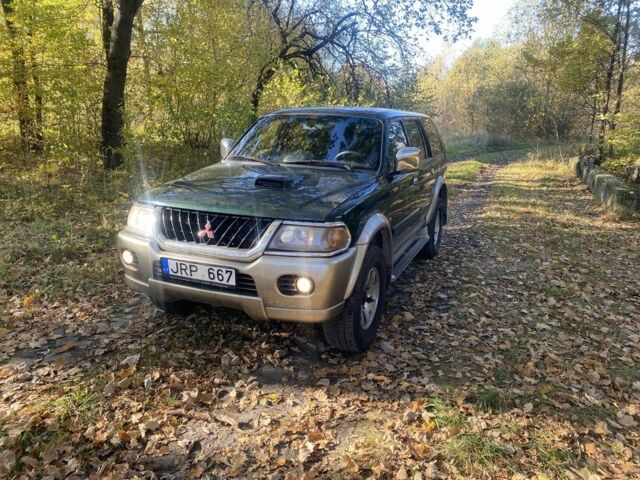 Зеленый Мицубиси Паджеро Спорт, объемом двигателя 2.5 л и пробегом 333 тыс. км за 4900 $, фото 1 на Automoto.ua