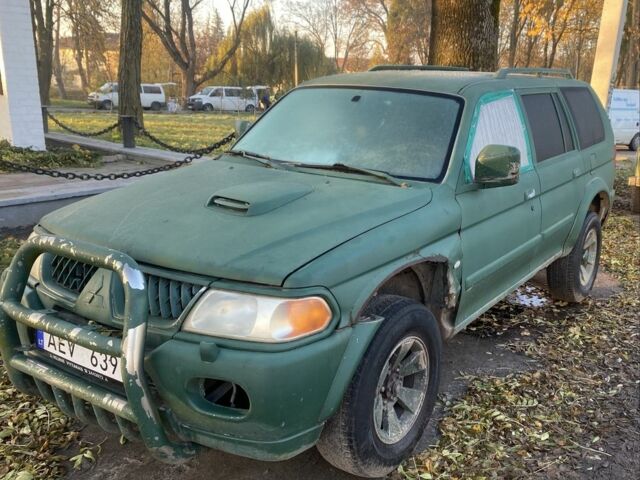 Зеленый Мицубиси Паджеро Спорт, объемом двигателя 2.5 л и пробегом 258 тыс. км за 2026 $, фото 1 на Automoto.ua