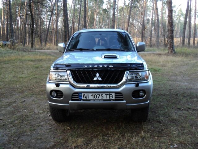 Зеленый Мицубиси Паджеро Спорт, объемом двигателя 2.5 л и пробегом 250 тыс. км за 9500 $, фото 1 на Automoto.ua