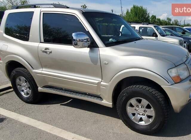 Бежевий Міцубісі Паджеро, об'ємом двигуна 2.97 л та пробігом 187 тис. км за 12900 $, фото 1 на Automoto.ua
