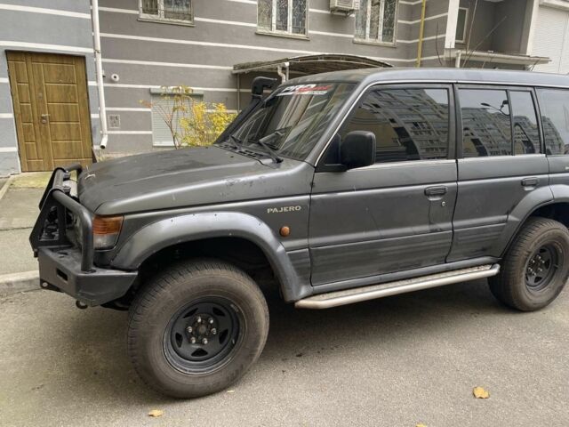 Чорний Міцубісі Паджеро, об'ємом двигуна 3.5 л та пробігом 350 тис. км за 4900 $, фото 1 на Automoto.ua