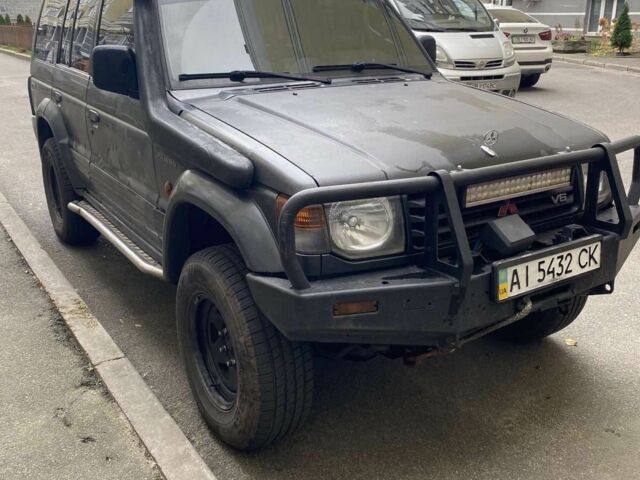 Чорний Міцубісі Паджеро, об'ємом двигуна 3.5 л та пробігом 350 тис. км за 4900 $, фото 1 на Automoto.ua