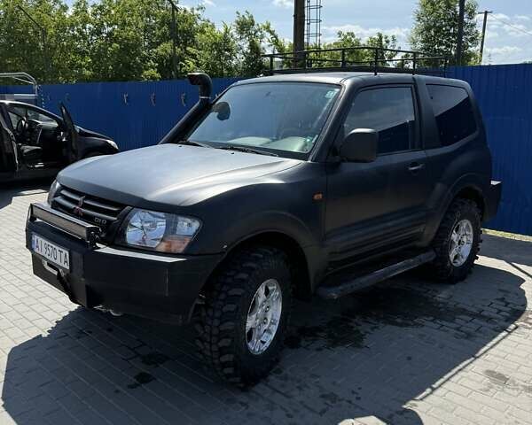 Чорний Міцубісі Паджеро, об'ємом двигуна 3.2 л та пробігом 100 тис. км за 11200 $, фото 1 на Automoto.ua