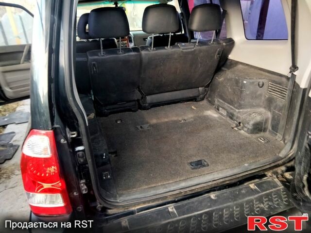 Чорний Міцубісі Паджеро, об'ємом двигуна 3 л та пробігом 244 тис. км за 7800 $, фото 1 на Automoto.ua