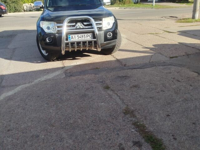 Черный Мицубиси Паджеро, объемом двигателя 3 л и пробегом 248 тыс. км за 10000 $, фото 1 на Automoto.ua