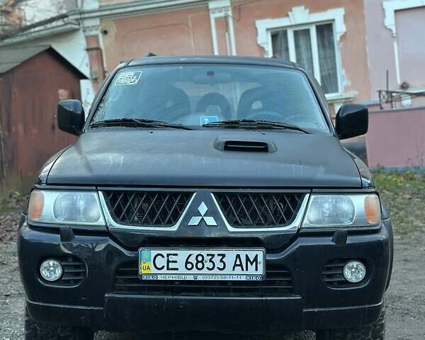 Чорний Міцубісі Паджеро, об'ємом двигуна 2.48 л та пробігом 104 тис. км за 8700 $, фото 1 на Automoto.ua