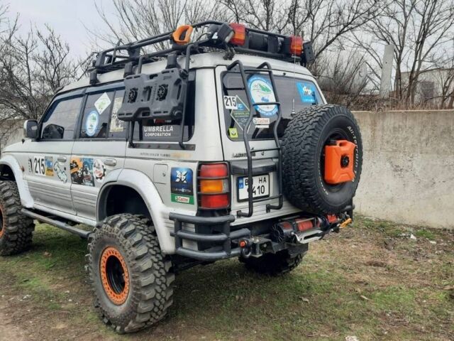 Серый Мицубиси Паджеро, объемом двигателя 2.8 л и пробегом 210 тыс. км за 10500 $, фото 1 на Automoto.ua