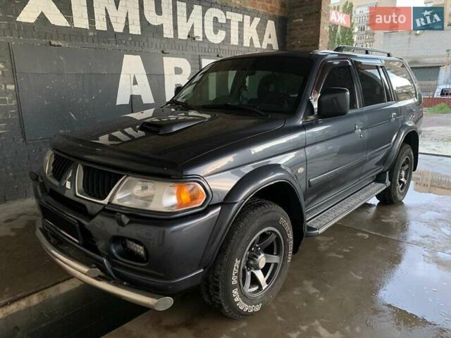 Серый Мицубиси Паджеро, объемом двигателя 2.48 л и пробегом 243 тыс. км за 11500 $, фото 1 на Automoto.ua