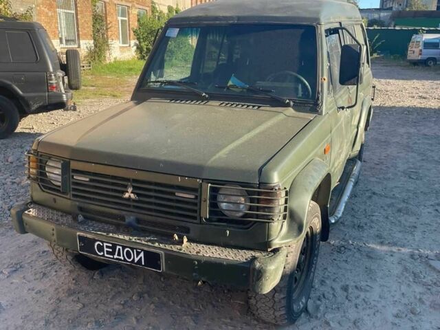 Синий Мицубиси Паджеро, объемом двигателя 2.6 л и пробегом 300 тыс. км за 1500 $, фото 1 на Automoto.ua