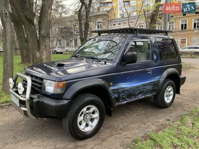 Синий Мицубиси Паджеро, объемом двигателя 2.84 л и пробегом 243 тыс. км за 7400 $, фото 1 на Automoto.ua