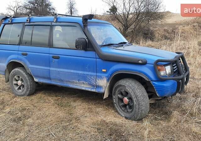 Синій Міцубісі Паджеро, об'ємом двигуна 3 л та пробігом 221 тис. км за 6800 $, фото 1 на Automoto.ua