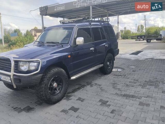 Синий Мицубиси Паджеро, объемом двигателя 2.97 л и пробегом 345 тыс. км за 10999 $, фото 1 на Automoto.ua