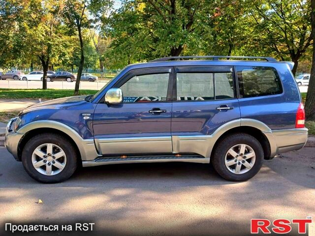 Синій Міцубісі Паджеро, об'ємом двигуна 3.8 л та пробігом 315 тис. км за 7300 $, фото 1 на Automoto.ua