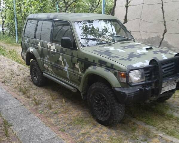 Зеленый Мицубиси Паджеро, объемом двигателя 2.8 л и пробегом 128 тыс. км за 3500 $, фото 1 на Automoto.ua