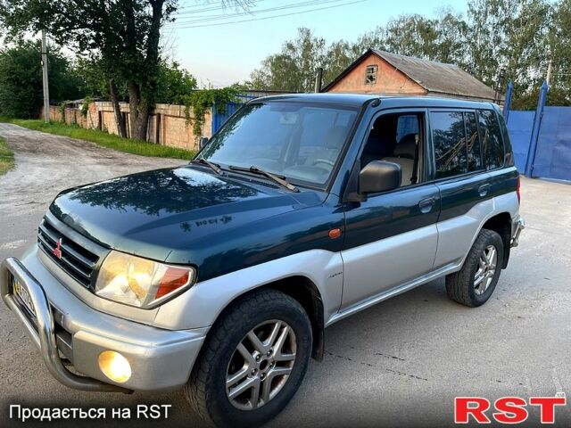 Зеленый Мицубиси Паджеро, объемом двигателя 1.8 л и пробегом 310 тыс. км за 5500 $, фото 1 на Automoto.ua