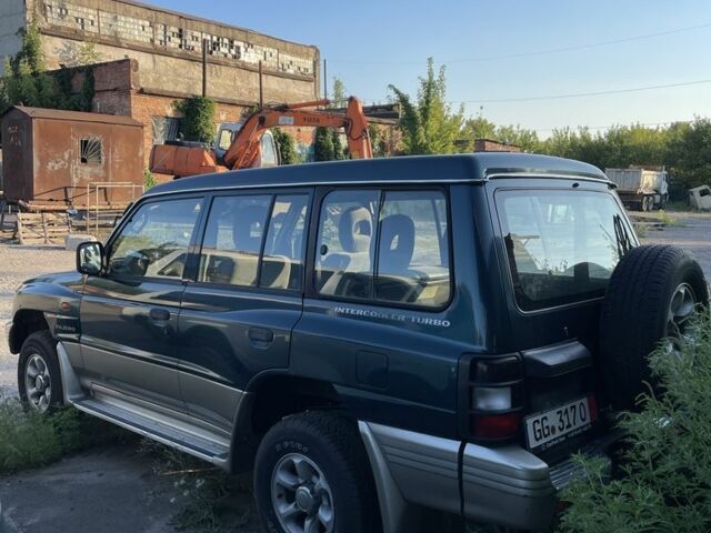 Зеленый Мицубиси Паджеро, объемом двигателя 2.5 л и пробегом 173 тыс. км за 5966 $, фото 1 на Automoto.ua