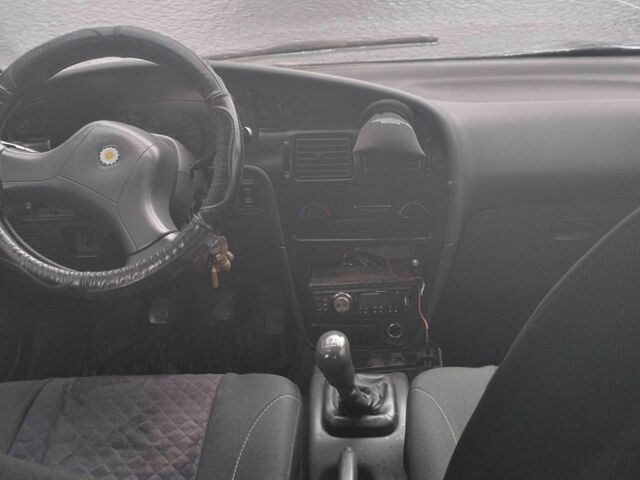 Серый Мицубиси Протон, объемом двигателя 1.6 л и пробегом 300 тыс. км за 1000 $, фото 1 на Automoto.ua