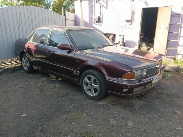 Красный Мицубиси Сигма, объемом двигателя 3 л и пробегом 350 тыс. км за 1500 $, фото 1 на Automoto.ua