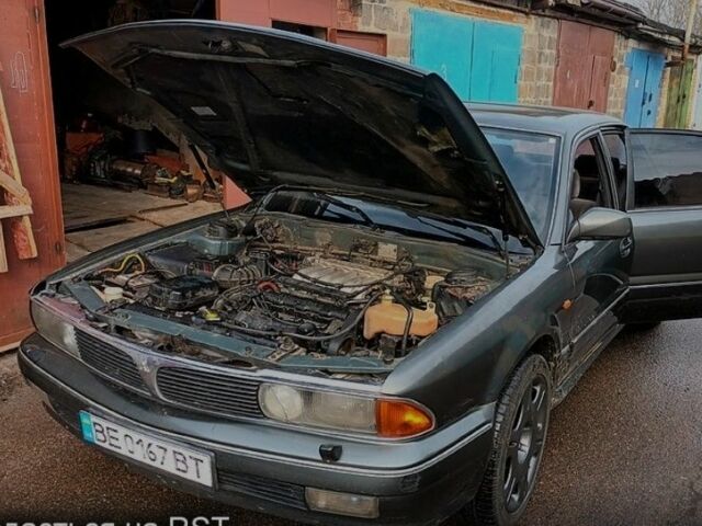 Серый Мицубиси Сигма, объемом двигателя 3 л и пробегом 370 тыс. км за 1546 $, фото 1 на Automoto.ua