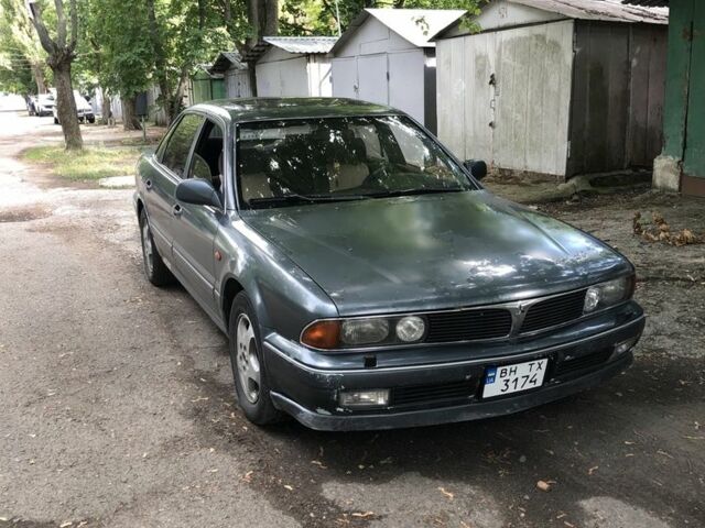 Серый Мицубиси Сигма, объемом двигателя 3 л и пробегом 300 тыс. км за 1500 $, фото 1 на Automoto.ua