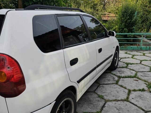 Белый Мицубиси Спейс Стар, объемом двигателя 1.6 л и пробегом 251 тыс. км за 2600 $, фото 1 на Automoto.ua