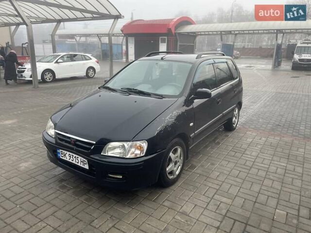 Черный Мицубиси Спейс Стар, объемом двигателя 1.3 л и пробегом 300 тыс. км за 2500 $, фото 1 на Automoto.ua
