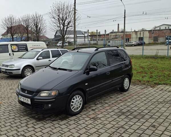Черный Мицубиси Спейс Стар, объемом двигателя 1.58 л и пробегом 478 тыс. км за 2600 $, фото 1 на Automoto.ua