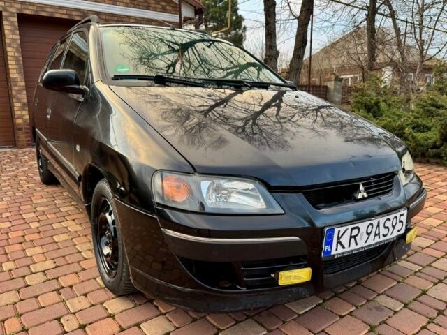 Черный Мицубиси Спейс Стар, объемом двигателя 1.6 л и пробегом 250 тыс. км за 1000 $, фото 1 на Automoto.ua