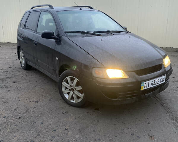 Чорний Міцубісі Спейс Стар, об'ємом двигуна 1.8 л та пробігом 400 тис. км за 2000 $, фото 1 на Automoto.ua