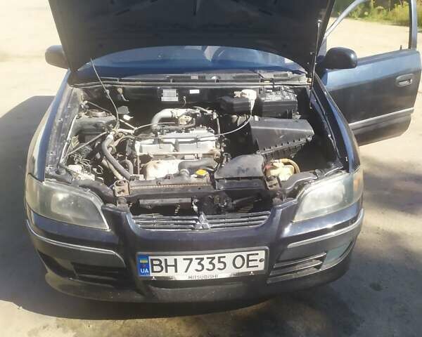 Черный Мицубиси Спейс Стар, объемом двигателя 1.58 л и пробегом 296 тыс. км за 2250 $, фото 1 на Automoto.ua