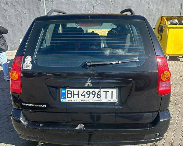 Міцубісі Спейс Стар 2004 у Одесі на Automoto.ua Чорний Міцубісі Спейс Стар, об'ємом двигуна 1.58 л та пробігом 242 тис. км за 3500 $, фото 1 на Automoto.ua