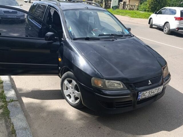 Черный Мицубиси Спейс Стар, объемом двигателя 1.6 л и пробегом 210 тыс. км за 2000 $, фото 1 на Automoto.ua