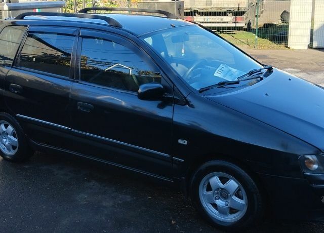 Чорний Міцубісі Спейс Стар, об'ємом двигуна 1.6 л та пробігом 360 тис. км за 3100 $, фото 1 на Automoto.ua