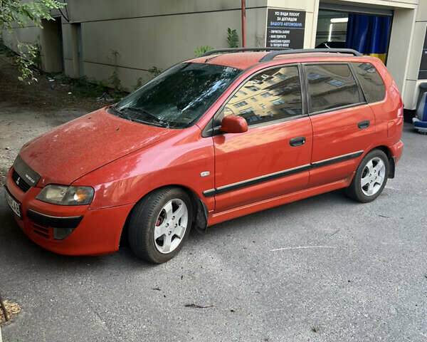 Красный Мицубиси Спейс Стар, объемом двигателя 1.6 л и пробегом 175 тыс. км за 3850 $, фото 1 на Automoto.ua