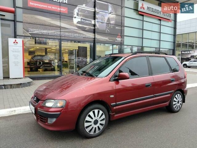 Красный Мицубиси Спейс Стар, объемом двигателя 1.83 л и пробегом 295 тыс. км за 3500 $, фото 1 на Automoto.ua