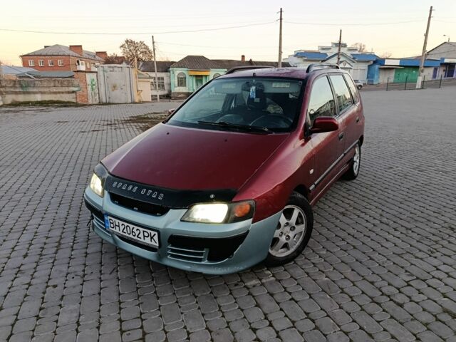 Красный Мицубиси Спейс Стар, объемом двигателя 1.6 л и пробегом 300 тыс. км за 2500 $, фото 1 на Automoto.ua
