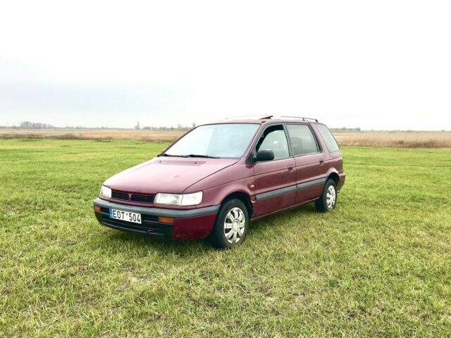 Красный Мицубиси Спейс Стар, объемом двигателя 2 л и пробегом 400 тыс. км за 900 $, фото 1 на Automoto.ua