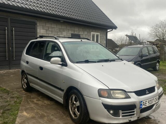 Серый Мицубиси Спейс Стар, объемом двигателя 1.6 л и пробегом 300 тыс. км за 2450 $, фото 1 на Automoto.ua