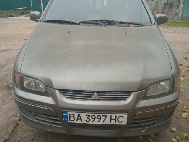 Серый Мицубиси Спейс Стар, объемом двигателя 1.6 л и пробегом 390 тыс. км за 1700 $, фото 1 на Automoto.ua
