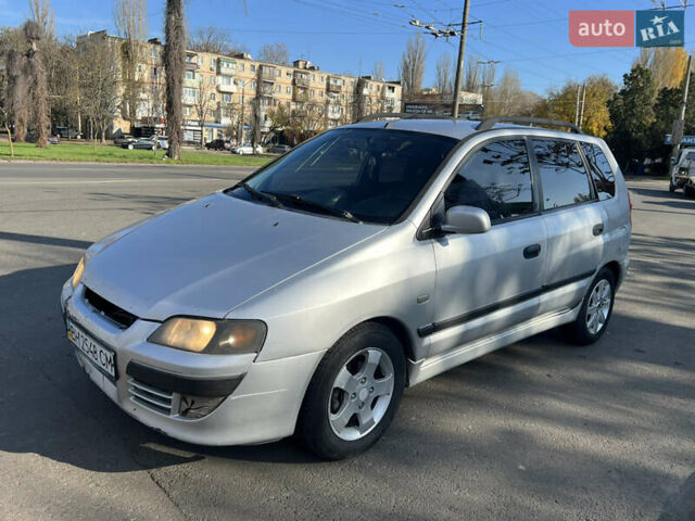 Сірий Міцубісі Спейс Стар, об'ємом двигуна 1.6 л та пробігом 200 тис. км за 1999 $, фото 1 на Automoto.ua