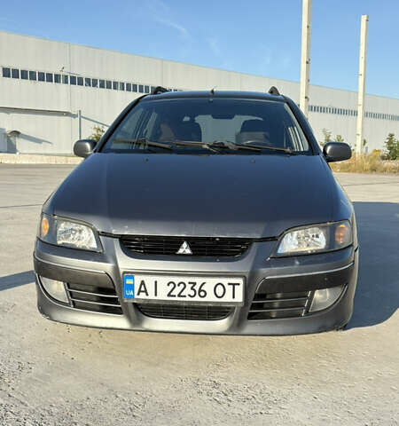 Сірий Міцубісі Спейс Стар, об'ємом двигуна 1.58 л та пробігом 250 тис. км за 3200 $, фото 1 на Automoto.ua