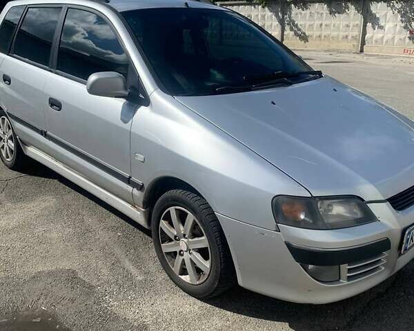 Серый Мицубиси Спейс Стар, объемом двигателя 1.58 л и пробегом 265 тыс. км за 3700 $, фото 1 на Automoto.ua